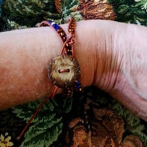 Hand crafted bead and leather bracelet